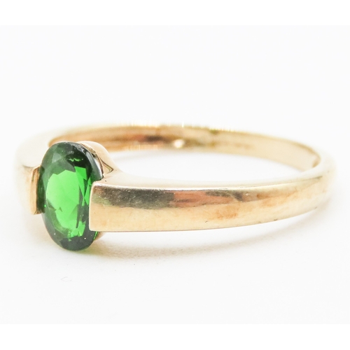 26 - Oval Cut Half Bezel Set Diopside Single Stone Ring Set in 9 Carat Yellow Gold Ring Size P