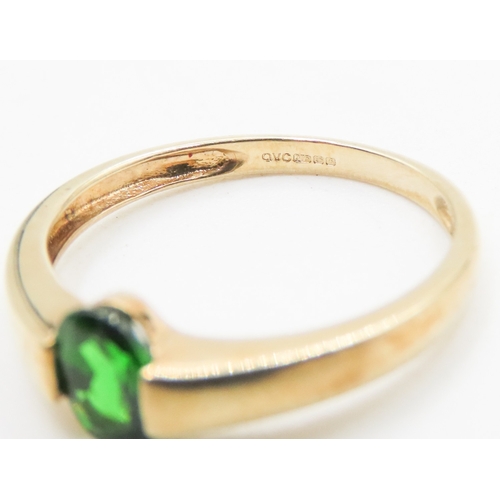 26 - Oval Cut Half Bezel Set Diopside Single Stone Ring Set in 9 Carat Yellow Gold Ring Size P