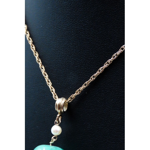 269 - Emerald and Pearl Drop Pendant Set on 14 Carat Yellow Gold Chain 66cm Long