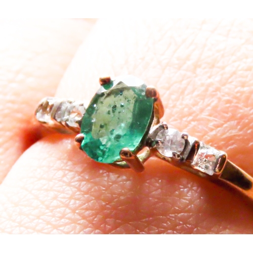 277 - Four Claw Set Emerald Ring Mounted in 9 Carat Yellow Gold with Gemstone Set to Shoulders Ring Size R... 