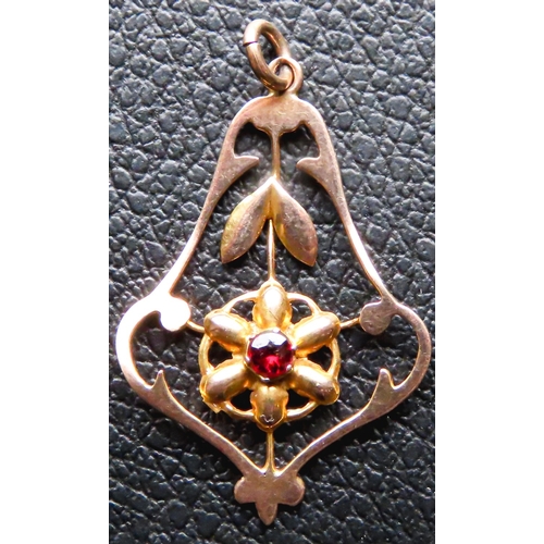 278 - 9 Carat Rose and Yellow Gold Red Garnet Set Floral Form Pendant 3cm High