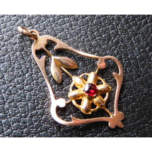 278 - 9 Carat Rose and Yellow Gold Red Garnet Set Floral Form Pendant 3cm High