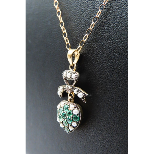 280 - Emerald, Seed Pearl and Diamond Set Heart and Bow Motif Gold on Silver Pendant 2cm High Set on 9 Car... 