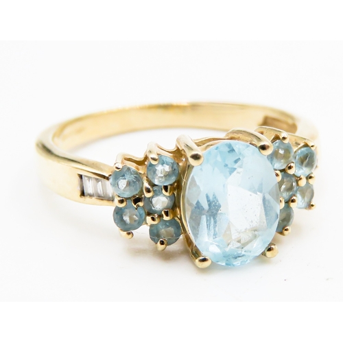 290 - Aquamarine Set Cluster Ring with Baguette Cut Diamonds Set to Shoulders Mounted in 9 Carat Yellow Go... 