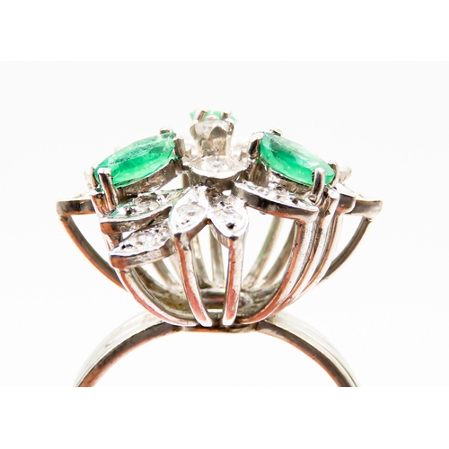 292 - Emerald and Diamond Floral Design Cluster Ring Mounted on 18 Carat White Gold Attractively Detailed ... 