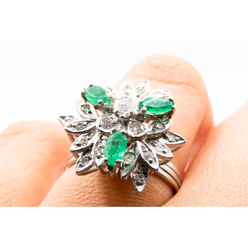 292 - Emerald and Diamond Floral Design Cluster Ring Mounted on 18 Carat White Gold Attractively Detailed ... 