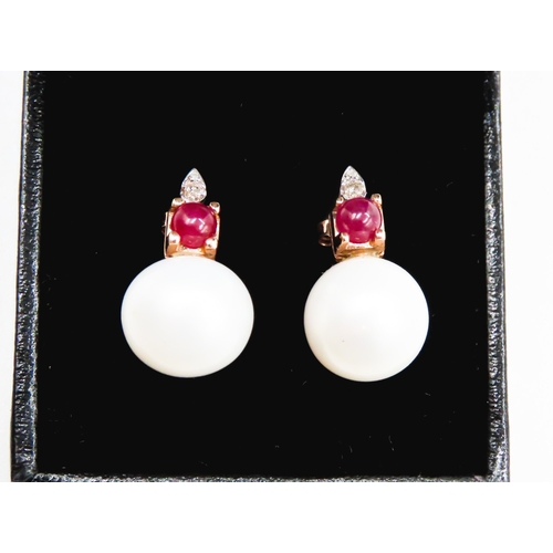 297 - Pair of Ruby and Diamond Set Pearl Earrings Mounted in 14 Carat Rose Gold Each 2cm High