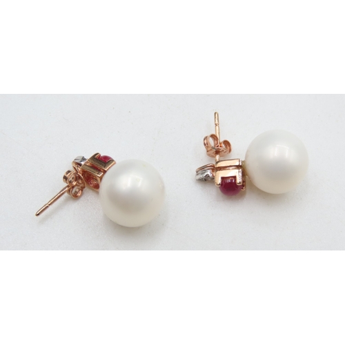 297 - Pair of Ruby and Diamond Set Pearl Earrings Mounted in 14 Carat Rose Gold Each 2cm High