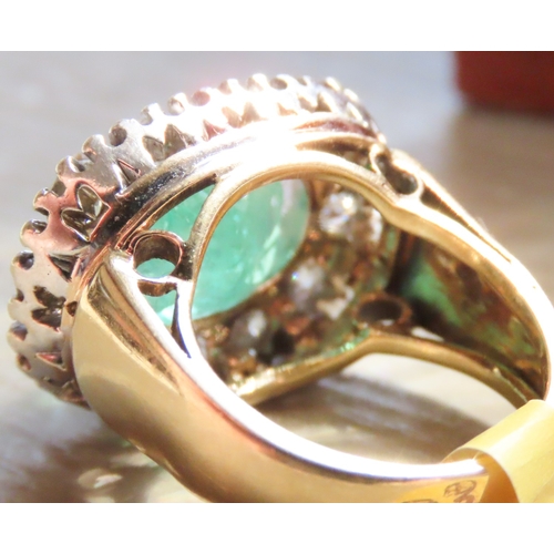 302 - Emerald Centre Stone Ring with Twelve Diamond Set Halo Surround Attractively Detailed Mounted in 18 ... 