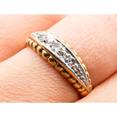 309 - Diamond Three Stone Ring Finely Detailed Set in 9 Carat Yellow Gold Ring Size Q and a Half