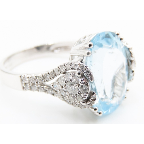 328 - Basket Set Aquamarine and Diamond Ring Mounted in 18 Carat White Gold Finely Detailed Diamonds Set t... 