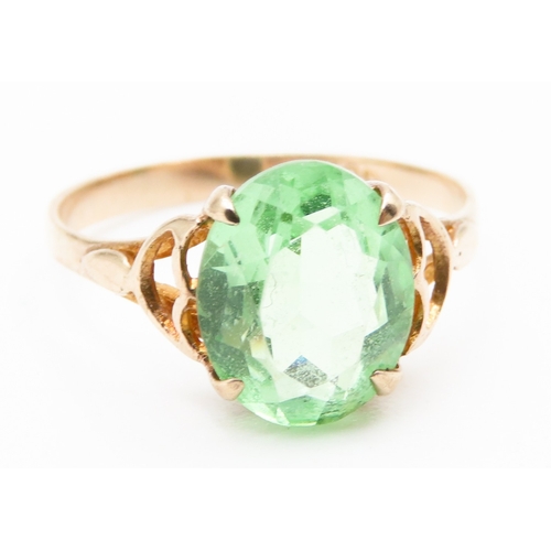 337 - 9 Carat Yellow Gold Green Gemstone Set Single Stone Ring Size N