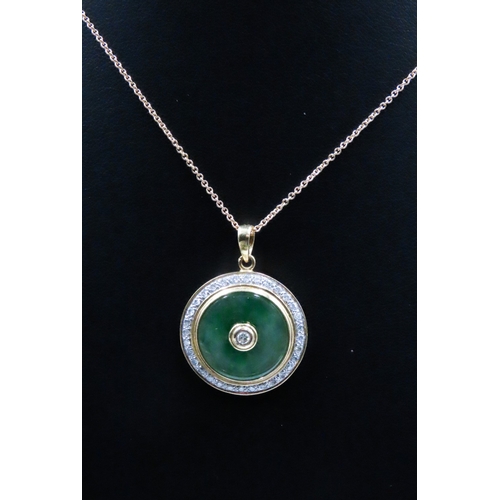 378 - Unusual Circular Form Jade Pendant Set in 18 Carat Yellow Gold with Diamond Surround Total Diamond C... 