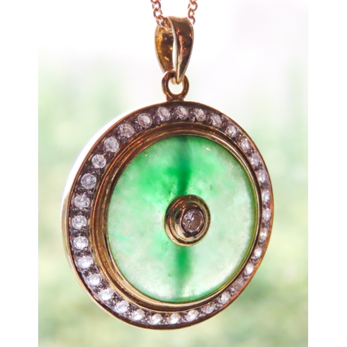 378 - Unusual Circular Form Jade Pendant Set in 18 Carat Yellow Gold with Diamond Surround Total Diamond C... 