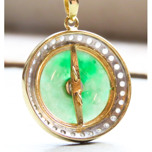 378 - Unusual Circular Form Jade Pendant Set in 18 Carat Yellow Gold with Diamond Surround Total Diamond C... 