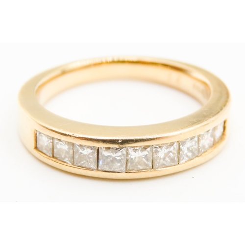 399 - Nine Stone Channel Set Diamond Ring Mounted in 18 Carat Yellow Gold Ring Size H