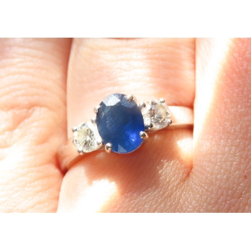 400 - Sapphire and Diamond Set Ladies Three Stone Ring Mounted in 18 Carat White Gold Ring Size N