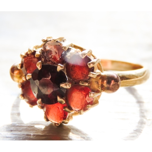 411 - 9 Carat Yellow Gold Red Garnet Set Cluster Ring Size M and a Half