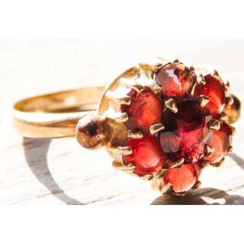 411 - 9 Carat Yellow Gold Red Garnet Set Cluster Ring Size M and a Half