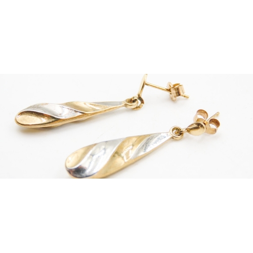 414 - Pair of 9 Carat Yellow and White Gold Twist Form Drop Earrings Each 3cm Drop