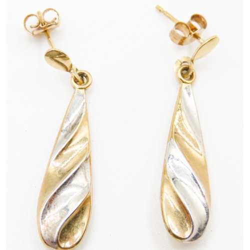 414 - Pair of 9 Carat Yellow and White Gold Twist Form Drop Earrings Each 3cm Drop