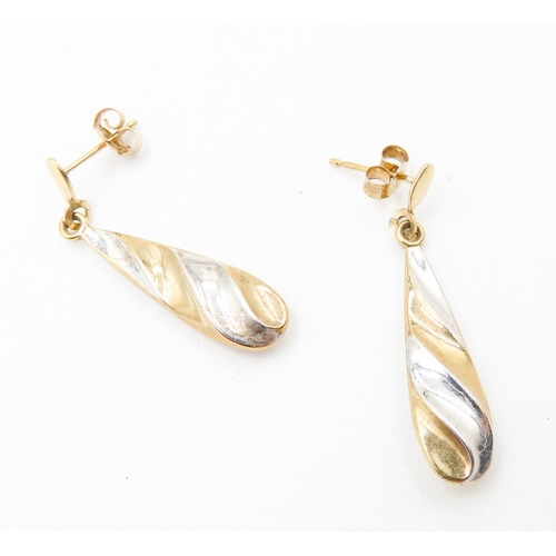 414 - Pair of 9 Carat Yellow and White Gold Twist Form Drop Earrings Each 3cm Drop