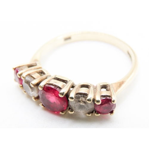 450 - Five Stone Ruby and Gemstone Set Ring Mounted in 9 Carat Yellow Gold Ring Size O