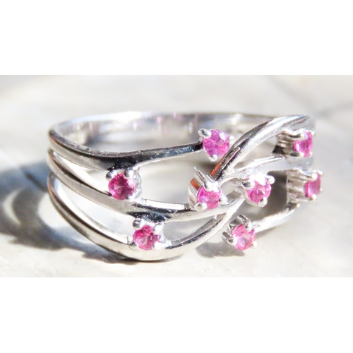 451 - Eight Stone Pink Tourmaline Set Ring Mounted in 9 Carat White Gold Size O