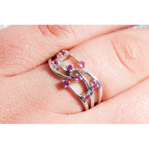 451 - Eight Stone Pink Tourmaline Set Ring Mounted in 9 Carat White Gold Size O