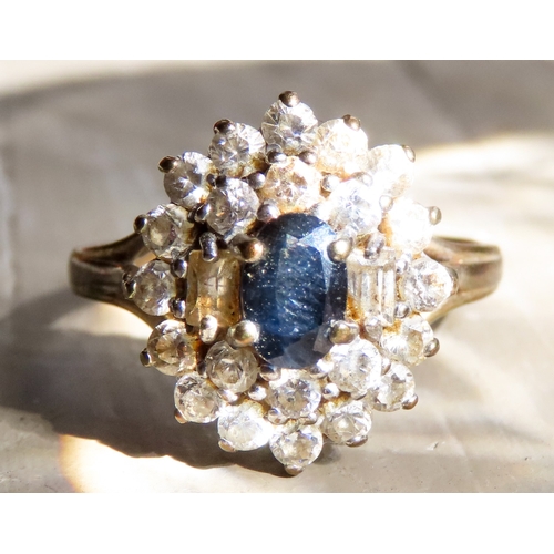 454 - Sapphire and Gemstone Set Ladies Cluster Ring Mounted in 9 Carat Yellow Gold Ring Size O