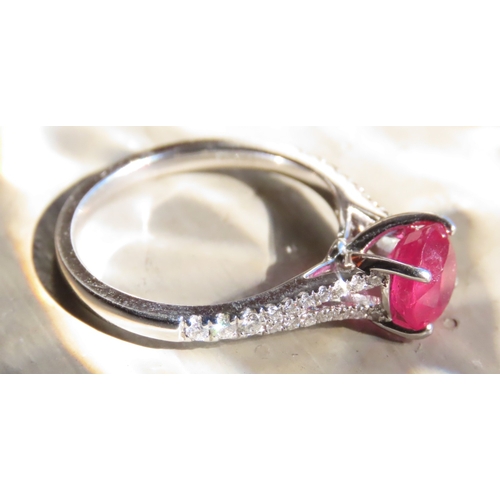 460 - Ruby Solitaire Ring Set in 18 Carat White Gold Further Diamonds Set to Sides Ring Size N