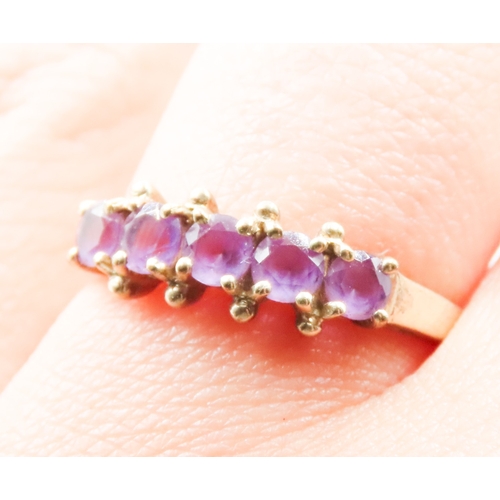 473 - Five Stone Amethyst Ring Set in 9 Carat Yellow Gold Ring Size P