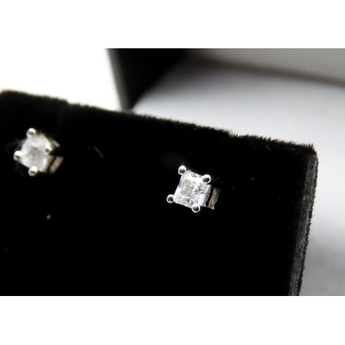 495 - Pair of 9 Carat White Gold Gemstone Set Stud Earrings