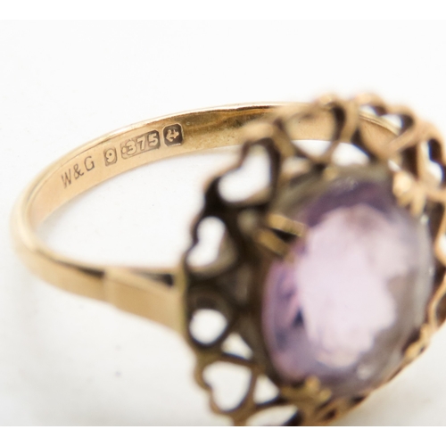 515 - Amethyst Set Single Stone Ring Attractively Detailed Mounted in 9 Carat Yellow Gold Ring Size L