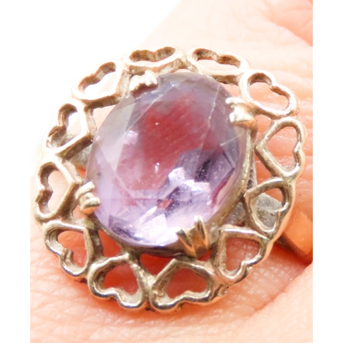 515 - Amethyst Set Single Stone Ring Attractively Detailed Mounted in 9 Carat Yellow Gold Ring Size L