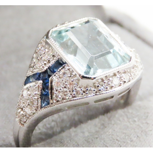 532 - Emerald Cut Aquamarine, Diamond and Sapphire Cluster Ring Mounted in Platinum Ring Size N