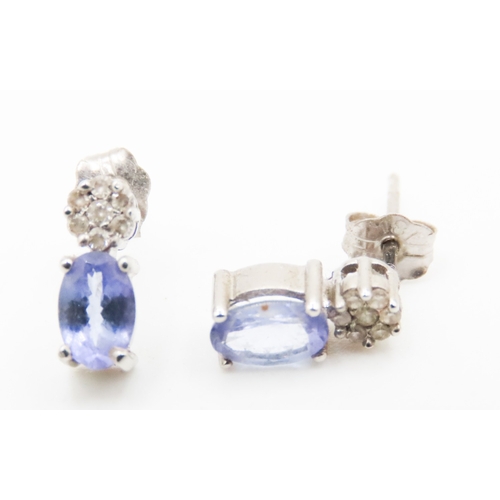 537 - Pair of Pale Tanzanite and Diamond Cluster Set Earrings Mounted in 18 Carat White Gold 1cm High