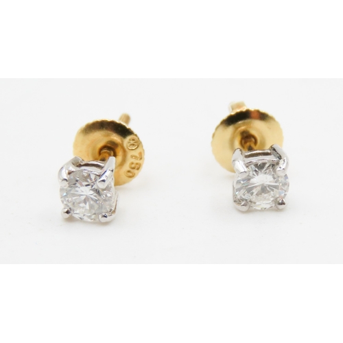 539 - Pair of Diamond Set Earrings Mounted in 18 Carat Yellow Gold