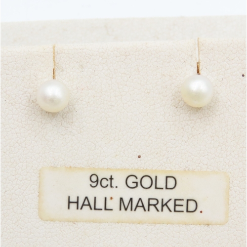 540 - Pair of 9 Carat Yellow Gold Pearl Set Earrings