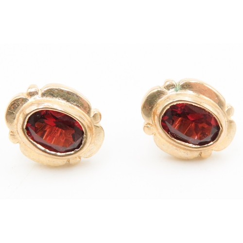 544 - Pair of Bezel Set Red Garnet Earrings Mounted in 9 Carat Yellow Gold 1cm High