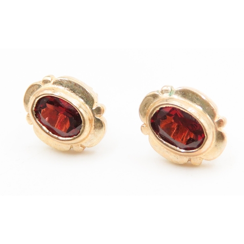 544 - Pair of Bezel Set Red Garnet Earrings Mounted in 9 Carat Yellow Gold 1cm High