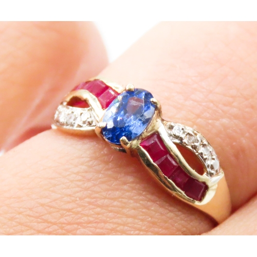 55 - Tanzanite Ruby and Diamond Set Crossover Form Ring Mounted in 10 Carat Yellow Gold Ring Size N