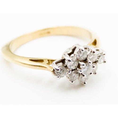 556 - Diamond Nine Stone Cluster Set Ring Mounted in 18 Carat Yellow Gold Ring Size M