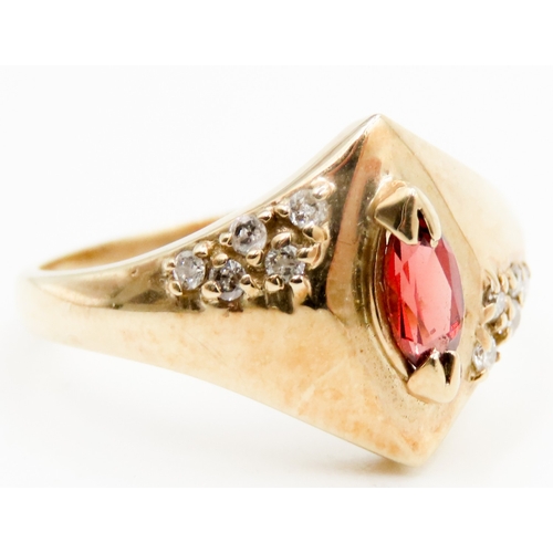 563 - Marquise Cut Red Garnet and Diamond Set Ring Attractively Detailed Mounted in 9 Carat Yellow Gold Ri... 