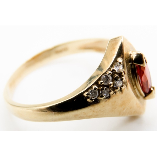 563 - Marquise Cut Red Garnet and Diamond Set Ring Attractively Detailed Mounted in 9 Carat Yellow Gold Ri... 