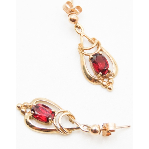 58 - Pair of Red Garnet Set Ladies Drop Earrings Mounted in 9 Carat Yellow Gold 2cm Drop