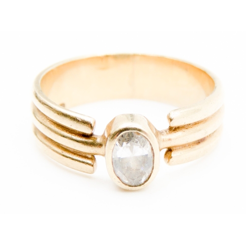 584 - Bezel Set White Topaz Single Stone Ring Mounted in 9 Carat Yellow Gold Ring Size N