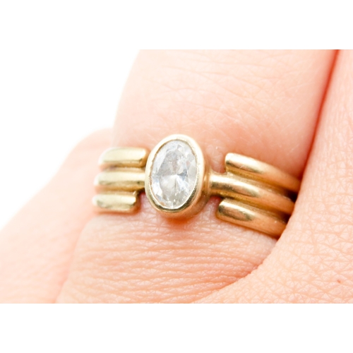 584 - Bezel Set White Topaz Single Stone Ring Mounted in 9 Carat Yellow Gold Ring Size N