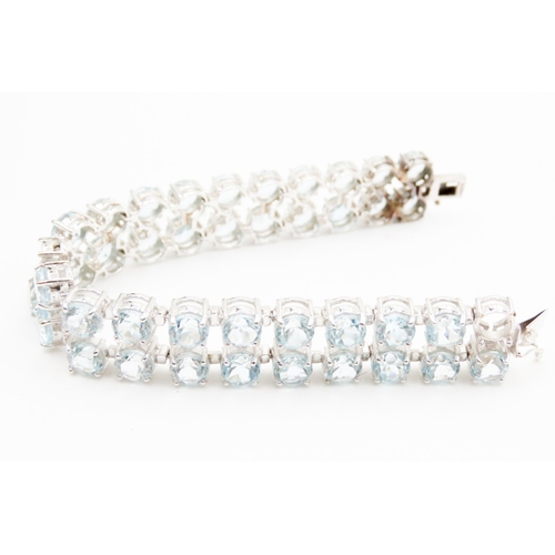 593 - Aquamarine Set Twin Row Bracelet Mounted in 9 Carat White Gold 17.5cm Long Width 2cm Articulated For... 