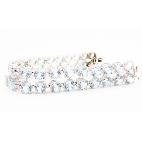 593 - Aquamarine Set Twin Row Bracelet Mounted in 9 Carat White Gold 17.5cm Long Width 2cm Articulated For... 